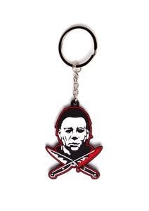 Michael Myers from the movie Halloween ll depicted on a white, black, and vibrant red soft-touch finish rubber keychain with sturdy attached split ring
