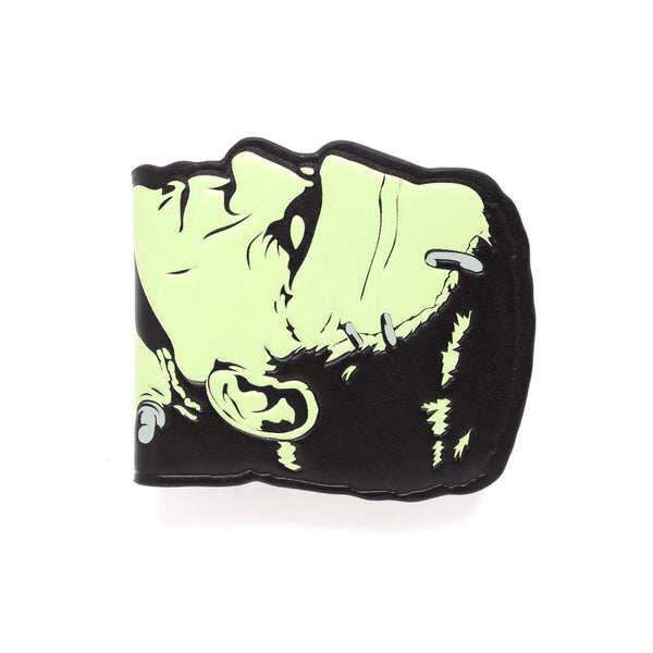 Black faux leather embossed billfold wallet in the shape of the head of Dr. Frankenstein’s Monster with ID window pocket, three card slots, 2 full length bill pocket, and a gunmetal snap closure. Shown closed
