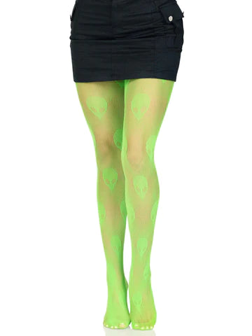 Neon green fishnet tights with all-over knit-in alien head pattern. Shown on a shoeless model from the front