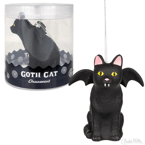 4” tall hand blown glass ornament of a black cat with bat wings and fangs. Shown in its acetate packaging 
