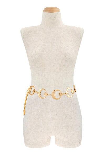 Gold metal crescent moon and starburst chain belt. Shown on a dress form