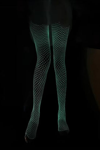 Glow in the dark fishnet pantyhose. Shown in the dark with green glow