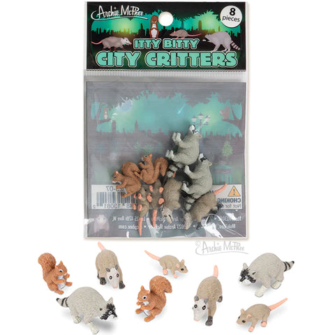 Soft vinyl raccoons, rats, possums, and squirrels seen in their plastic packaging 