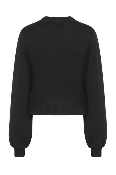 Black pullover sweater with slightly ballooned sleeves. Shown from back