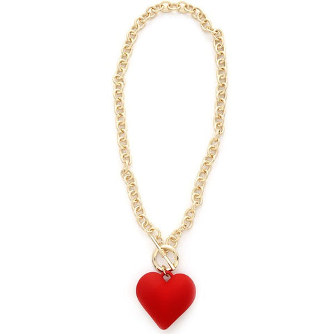 Gold oval link chain necklace with toggle clasp and large red soft touch finish heart charm
