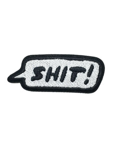 Cartoon speech bubble embroidered patch with the word “SHIT!” in black and white 