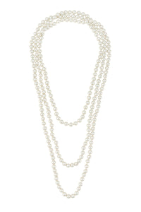 84” long bright white faux pearl necklace shown in triple layer wear