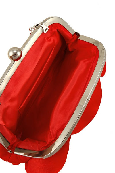 Purse made of a shiny satiny bright red fabric with layers of petal shapes sewn onto the body of the bag to resemble a rose. Silver metal hardware with a kiss lock and silver metal link chain strap.  Shown open