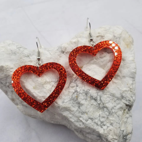 Laser-cut red glitter acrylic hollow shaped heart dangle earrings