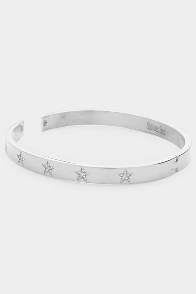 Stainless steel hinge bangle with star details inlaid with tiny rhinestones. Shown open