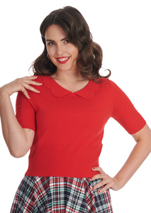 A model wearing a knit bright red sweater with elbow length sleeves, a scalloped collar, and wide ribbed bottom band. Shown from the front