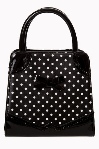 Rectangular vinyl purse with black and white polka dot fabric body and matching black vinyl bow detail