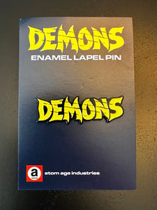 Demons bright yellow tire tread logo enamel pin