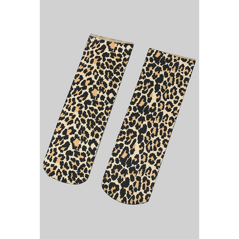 A pair of stretchy leopard print ankle socks shown flat