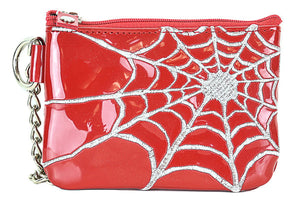 Red rectangular vinyl zippered coin purse with silver metallic thread stitched spiderweb detail off center. Has attached D-ring with 6” chain.