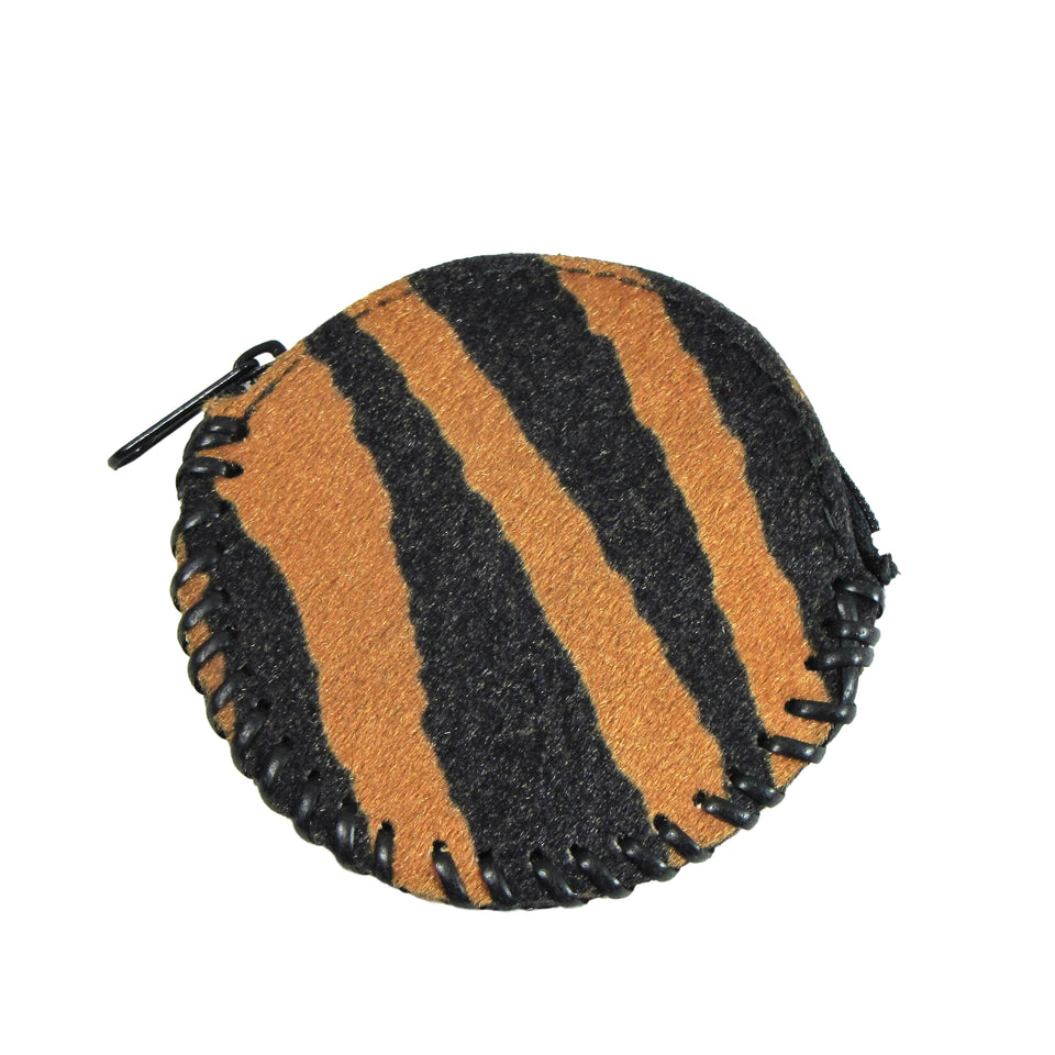 Round zippered coin purse with a thick stitched trim in tiger print faux pony