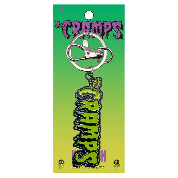 The Cramps keychain on its original green and yellow gradient backing card. 