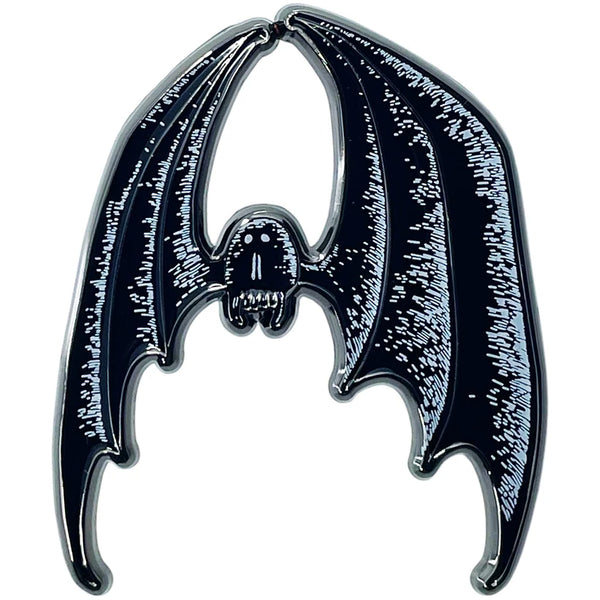 Enameled metal clutch-back pin of Dracula in bat form from Edward Gorey's illustrated costume and set designs for the 1977 Broadway revival of Dracula