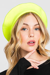 French style acrylic beret in neon yellow, shown on a model