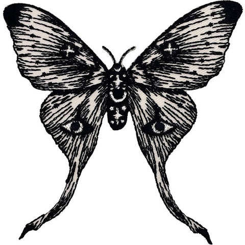 Black embroidered patch on off-white canvas of a sketch style moth with star and eye motifs on its wings