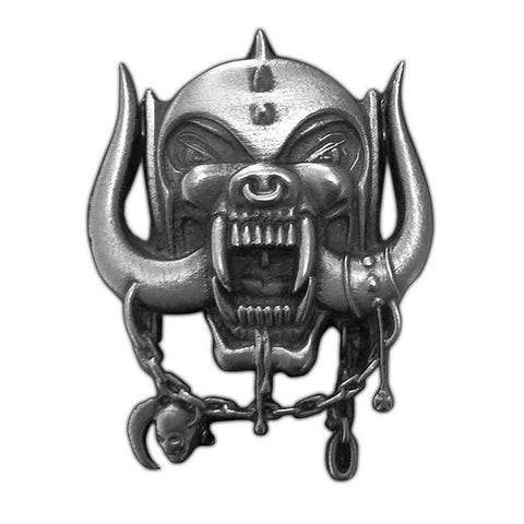 Motörhead’s classic War Pig or “Snaggletooth” logo, created in 1975 by Joe Petagno, as a die-cast metal pin. shown against a white background.