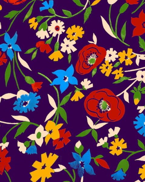 dark purple-y blue background sketch style floral allover pattern with red, blue, orange, yellow, and off-white wildflowers. Closeup of pattern art