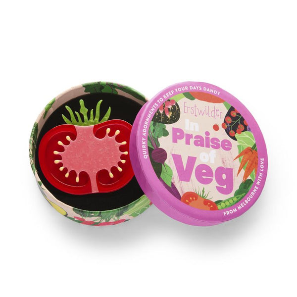 red and green layered acrylic resin tomato slice shaped brooch, shown in illustrated round box packaging
