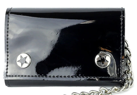 Black patent finish faux leather tri-fold chain wallet with double snap closures decorated with black stars. Shown closed from the front