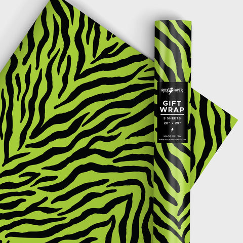 a roll of matte finish gift wrap in an all-over neon green and black tiger print pattern. Shown in a roll and flat