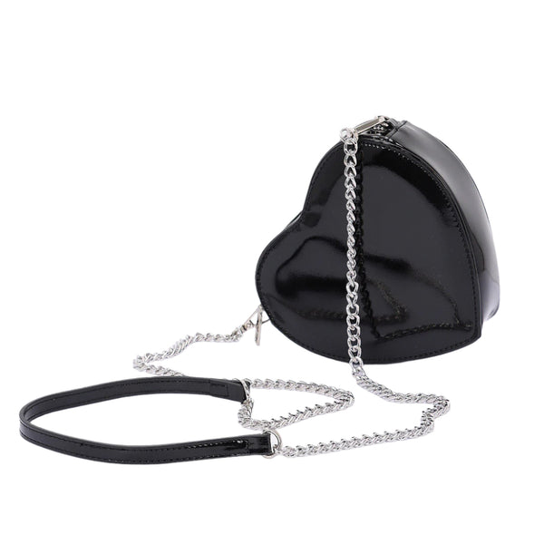 Shiny black heart-shaped vinyl purse with zip closure and detachable silver metal chain cross-body strap with included vinyl strap piece