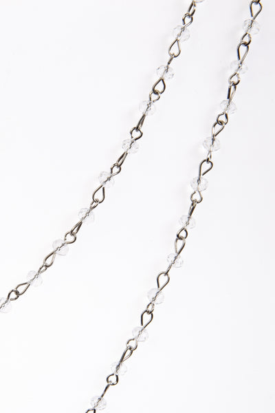 clear round faceted glass linked bead strand necklace in 60" length. Shown doubled in close up