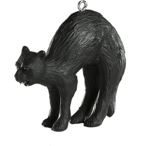 resin painted ornament in the shape of a hissing black cat