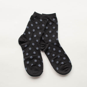 cotton knit socks in black with an allover dark grey polka dot knit-in pattern