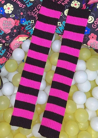 hot pink and black ribbed striped leg warmers shown flat