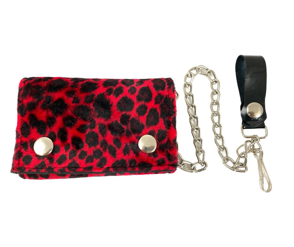 A fuzzy black and wine red leopard print faux-fur tri-fold chain wallet with a detachable wallet chain and a snap closure coin pouch.
