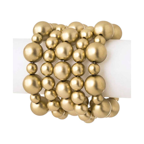 set of 5 bracelets of varied size smatte finish gold acrylic beads strung on stretch filament