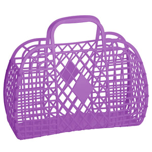A large purple rectangular handbag made of plastic with a retro diamond and lattice pattern