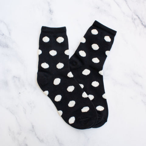 black cotton blend socks with an allover textured puffy bright white polka dot knit-in pattern