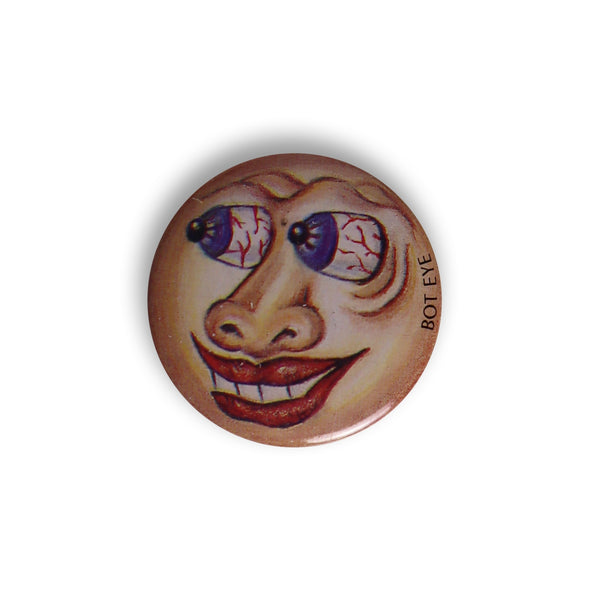 1.5" deadstock pinback button of cartoon face with bulging bloodshot blue eyeballs and caption "BOT EYE". Shown from front