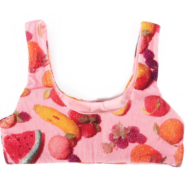 ribbed texture spandex bralette style bikini top in light pink background photorealistic beaded faux fruit pattern. Shown from back