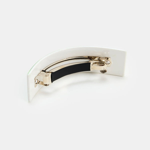 curved acetate pinch clip style barrette with photorealistic watermelon rind design. Shown from back to display clip hardware