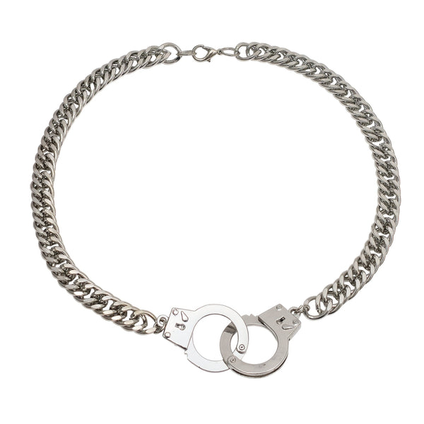 silver stainless steel cuban link style necklace with pair of matching handcuffs in center. Shown flat