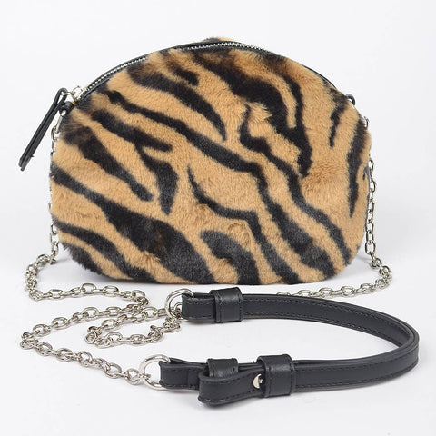 tiger print black and orange faux fur handbag with a chain strap and faux black leather shoulder piece on a white background