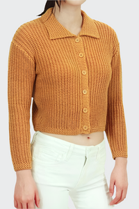 muted bronze-y mustard yellow chunky knit cardigan with contrast texture pointed collar and 3/4 sleeves in a slightly cropped length, shown on model