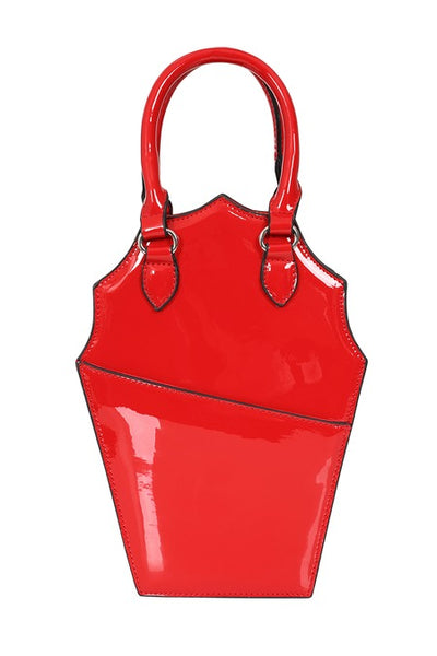 Cherry red patent vinyl handbag in the shape of a scalloped coffin with a black bow detail, hand strap, and black spiderweb patterned stitching. Shown from back