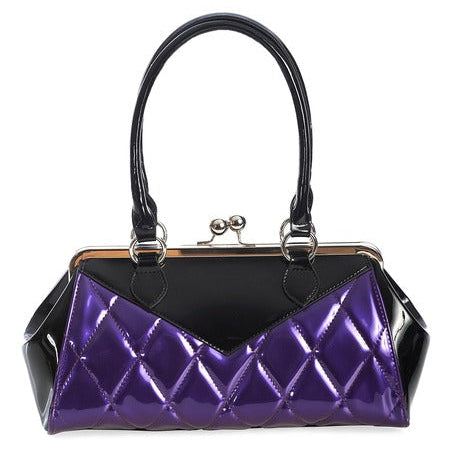 Vintage-inspired handbag made of black and red vinyl with purple pearly quilted body and black sides & top with matching black handles. Purse has silver metal kiss lock opening and matching detachable shoulder strap. Shown from front