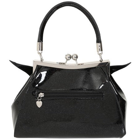 A black patent vinyl with shimmery silver handbag with a glossy finish, featuring a bat-wing design on the front, a top handle, and a silver-tone kiss-lock clasp. Shown from back to display exterior zipper pocket 