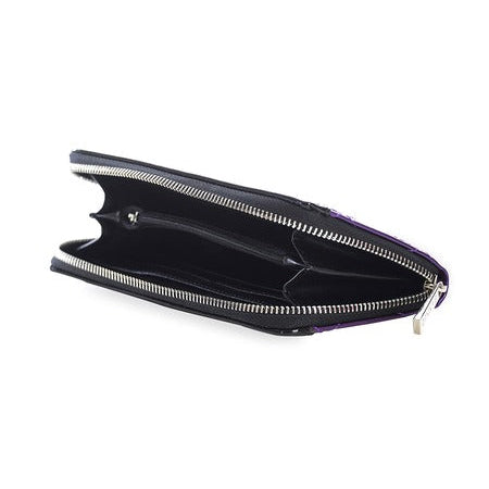 Shiny patent purple quilted vinyl zip closure wallet with solid black vinyl triangular detail at top and 3 sided silver metal zip closure. Shown from side unzipped