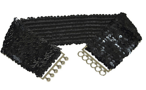black sequin elastic waist belt with a silver metal clasp on a white background
