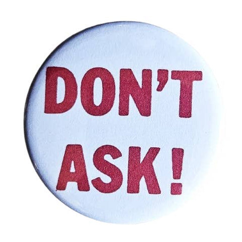 1.25" round pinback button with white background and DON'T ASK! in red letters